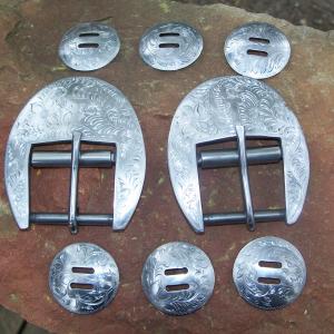 Cinch buckles and sloted conchos